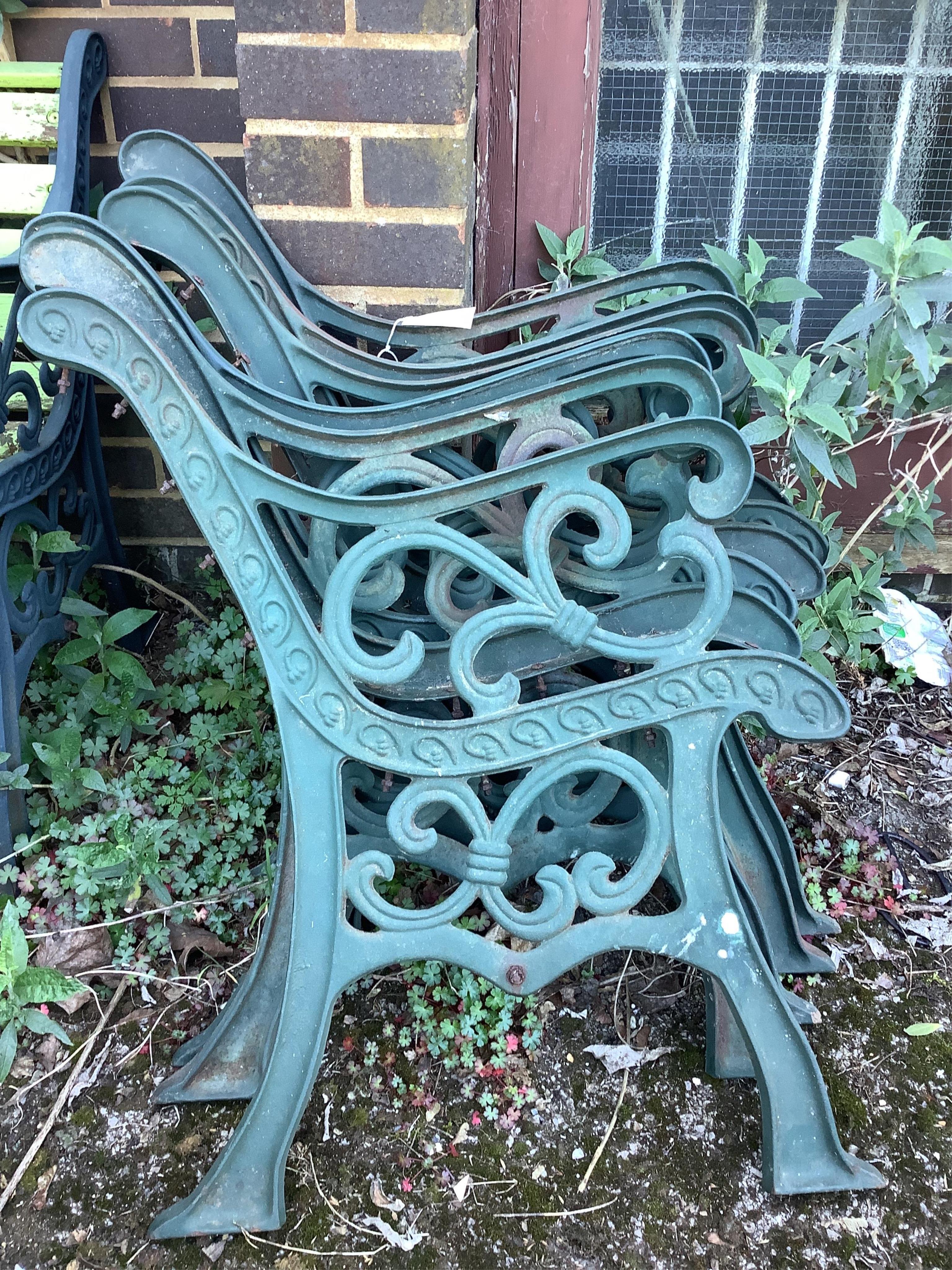 Six (three pairs) of Victorian style cast iron bench ends
